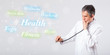 Clinical doctor pointing to health and fitness collection of wor
