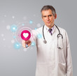 Middle aged doctor pressing modern medical type of button