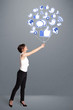 Pretty woman holding social icon balloon
