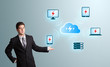 Photo: Young man presenting cloud computing network Young man presenting cloud computing network