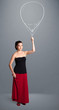 Beautiful woman holding balloon drawing