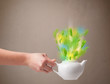 Tea pot with leaves and colorful abstract lights