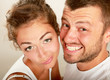 Young man and woman together over white background