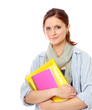 Photo: A smiling female student holding books A smiling female student holding books