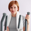 Training, fitness - woman at the gym on a crosstrainer.