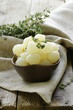 small pickled pearl onions on a wooden table