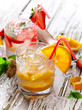 Summer drinks on vintage wooden background
