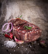 Photo: Premium Raw beef sirloin on wooden table Premium Raw beef sirloin on wooden table