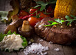 Delicious beef steak on wooden table