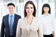 Photo: Business people with businesswoman leader Business people with businesswoman leader