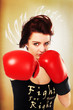 pretty lady with red boxing gloves