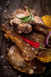 Delicious lamb chops on wooden table