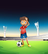 A field with a soccer player in a red uniform