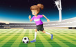 A girl at the field playing football