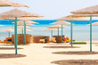 Photo: Relax under parasol on the beach of Red Sea, Egypt Relax under parasol on the beach of Red Sea, Egypt