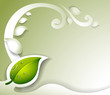 Vector: A gray colored stationery with a green leaf A gray colored stationery with a green leaf