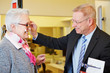 Woman buying glasses at optician