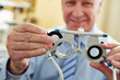 Photo: Optician with trial frame Optician with trial frame