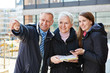 Photo: Family with map on sightseeing tour Family with map on sightseeing tour