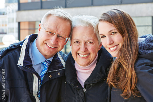 Photo: Happy seniors with grandchild Happy seniors with grandchild
