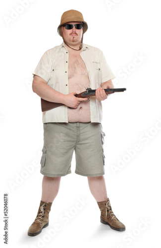 Photo: Park ranger or bodyguard dressed in a safari suit with shotgun. Park ranger or bodyguard dressed in a safari suit with shotgun.