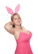 Photo: Funny pink bunny. Plus size woman with rabbit ears. Funny pink bunny. Plus size woman with rabbit ears.