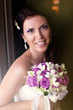 Foto: Bride' s portrait and wedding bouquet Bride' s portrait and wedding bouquet