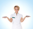 Young and smart doctor over blue background