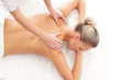 Foto: Young attractive woman on a spa massage procedure Young attractive woman on a spa massage procedure