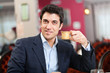 Foto: Man having a coffee at the restaurant Man having a coffee at the restaurant