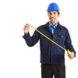 Foto: Portrait of an engineer using a measuring tape Portrait of an engineer using a measuring tape