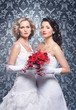 Young, beautiful and emotional brides with beautiful flowers