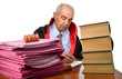 Senior adult judge with stack of files waiting for his attention