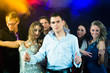 party people dancing in disco club