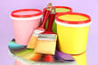 Set for painting: paint pots, brushes, palette of colors