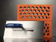 Metal tool for building and bricks isolated on black