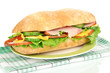 Fresh and tasty sandwich with ham and vegetables isolated