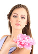 Young woman with beautiful hairstyle and flower, isolated