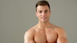 Portrait of Handsome Muscular Man Posing on Natural Background