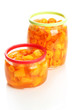 Orange jam with zest, isolated on white