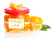 Orange jam with zest and tangerines, isolated on white