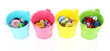 Colorful buttons in buckets isolated on white