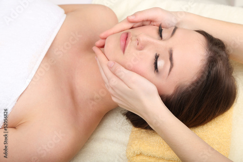 Photo: Beautiful young woman in cosmetic salon close up Beautiful young woman in cosmetic salon close up
