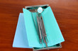 Dentist tools on wooden table