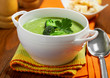 Broccoli cream soup on table