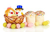 Easter eggs and two chicken toys isolated on white