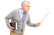 An angry mature teacher holding a wand and gesturing