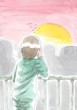 夕日を見つめるサラリーマン