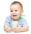 Cute little boy with a glass of milk