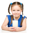 Cute little girl with a glass of milk
